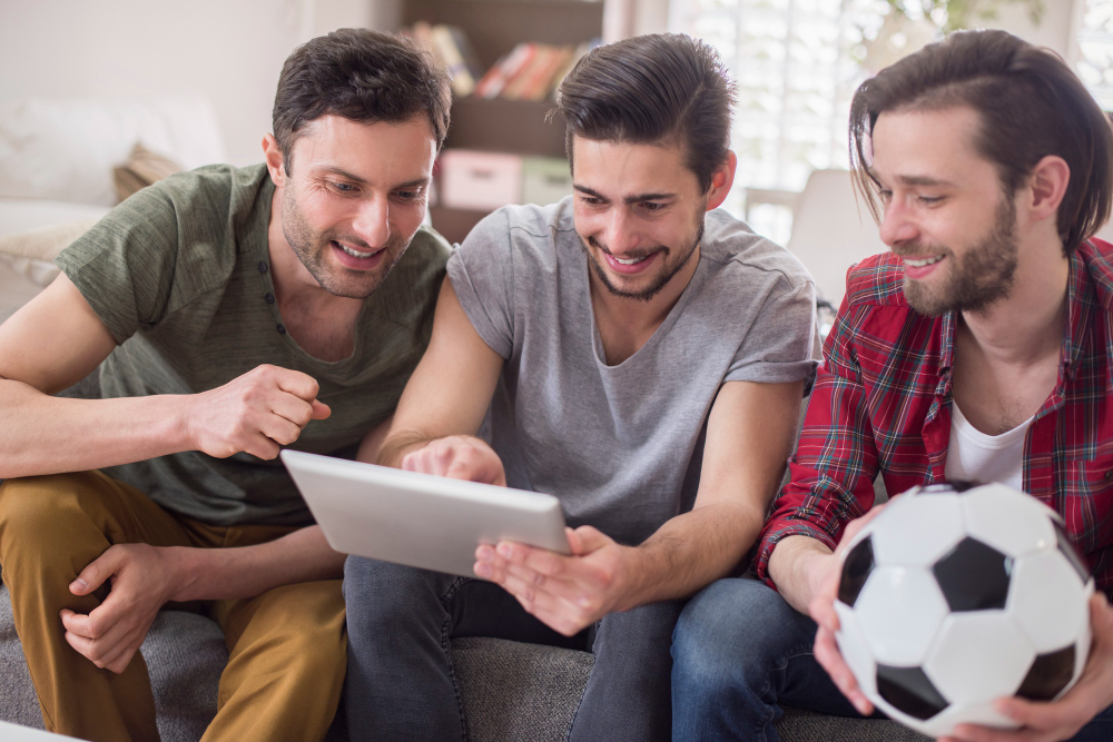 men watching video tablet